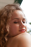 Alluring queen Wanda as was born on the balcony boldly showing a unshaved slit