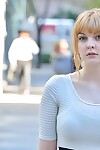 Alluring teen golden-haired flashes her mammoth front bumpers and strolls bare down the street