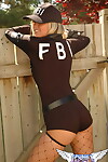 FBI floozy Alicia in fishnet nylons sheds her uniform to pose exposed outdoors