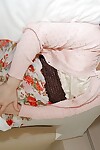 Eastern doll Minori Nagakawa striptease down and exposing her curly wet crack