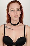 Juvenile year old redhead wears a choker during the time that erotic dance to a brown tie