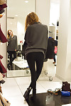 Wiry vivacious fairy-haired youthful Reese Berkman bending over in a store