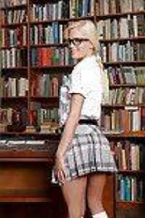 Blonde Euro chicita Candee Licious hikes schoolgirl petticoat to jiffy shorts