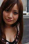 Smiley Chinese darling Saki Mitsui undressing and amplifying her lower lips