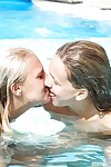 Barely legal lesbian Sara J and her girlfriend share tongue kiss in pool