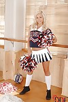 Blonde cheerleader teen Tracy Lindsay takes off her sexy clothes