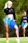 Cheerleaders Adriana Sephora and Spencer Scott go girl on girl outdoors