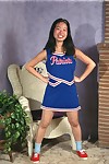 Asian amateur Ivy shedding cheerleader uniform for hairy cunt exposure