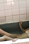 Nice-looking Chinese beautiful China Yuki showcasing her seductive bends in the shower-room