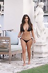 Appealing celeb kim kardashian plays in bikini