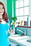 Redhead young model Sasha Torment erotic dance and toying her cum-hole in the kitchen