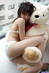 Attractive Japanese juvenile Haruka Tsukino lets her compact boobs loose of bikini dom