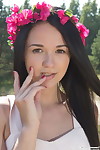 Teen brown hair Olivia wears a crown of flowers although exposing her love button