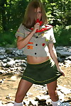 Nasty amateur doll teases next to a stream in her Angel Guides uniform